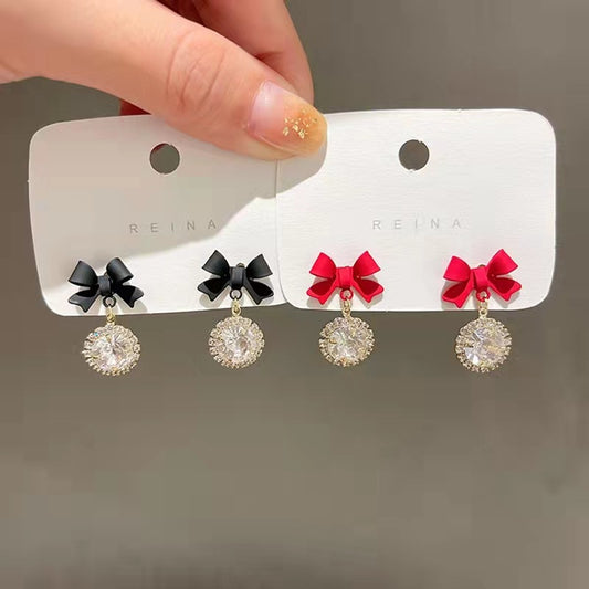 Sparkle Bow Drop Studs