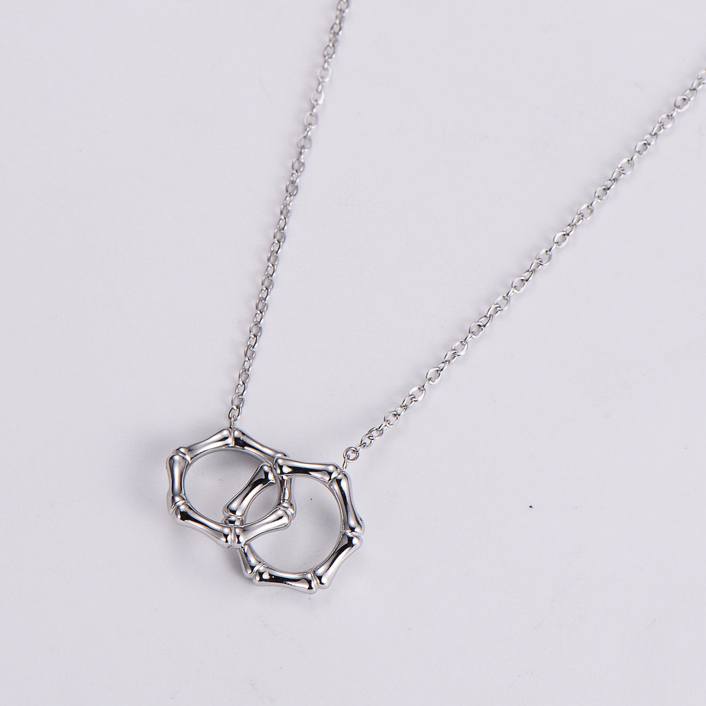 Intertwined Bamboo Circle Necklace