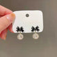 Sparkle Bow Drop Studs