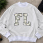 Reversible Varsity Mock Neck Sweater